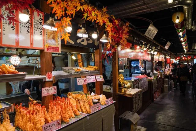 Lauren Breedlove/Travel + Leisure Stalls inside of Nishiki Market.