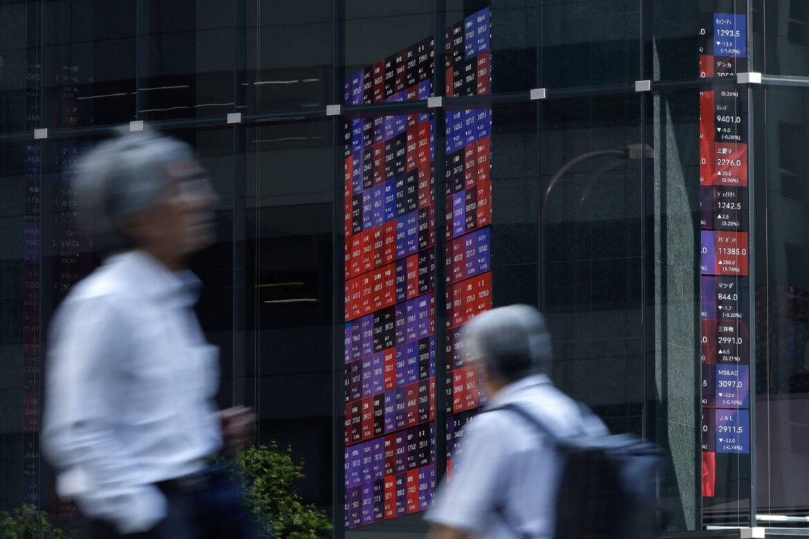 Tokyo stocks hit closing-price record as GDP surprises