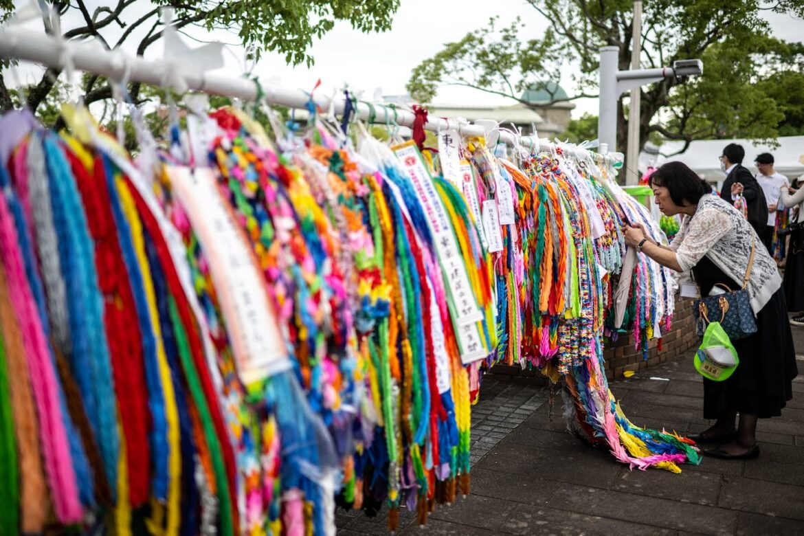 How people-to-people ties forged peace after World War II People place paper cranes at the Peace Park in Nagasaki on August 8, 2025, ahead of the 80th anniversary of the atomic bombing of Nagasaki.