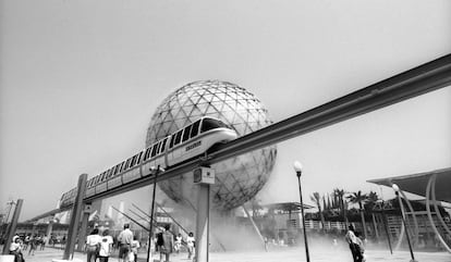 An elevated monorail passes by the symbolic sphere that was built for Expo ‘92, in Seville, Spain.