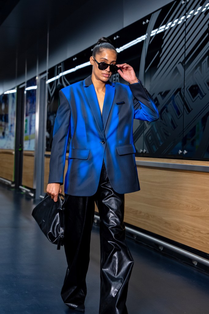 Skylar Diggins, wearing a blue blazer, arrives to the arena.