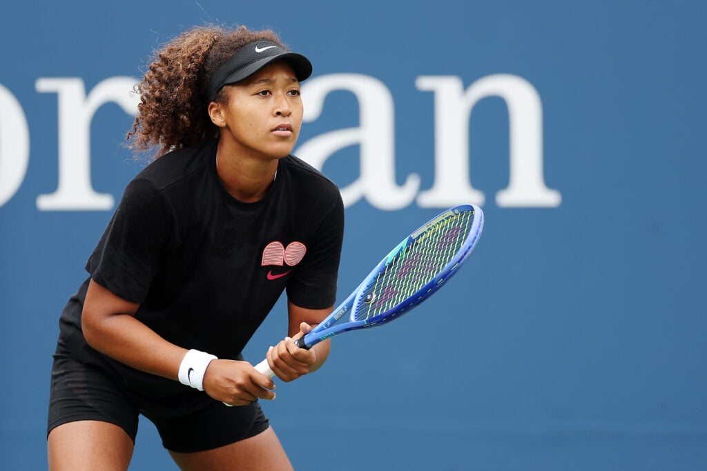 Naomi Osaka prepares to hit a shot