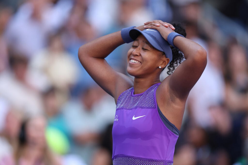 Naomi Osaka celebrates after reaching the fourth round of the 2025 US Open.