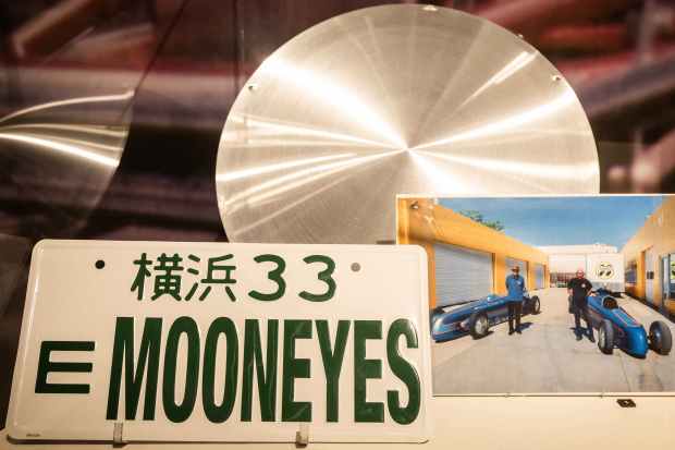 Mooneyes MOON Disc for hot rods is seen in Cruising...