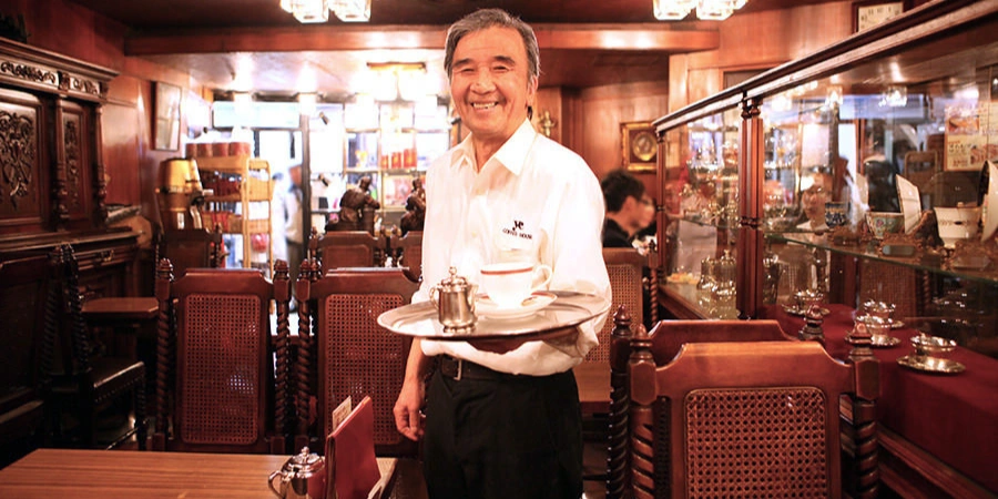 the patron at kissaten New YC (ニューＹＣ) in Osaka with a tray of classic japanese coffee