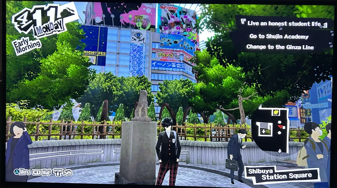 Screenshot of Hachikō's statue in Persona 5. Joker poses in front of the statue. 