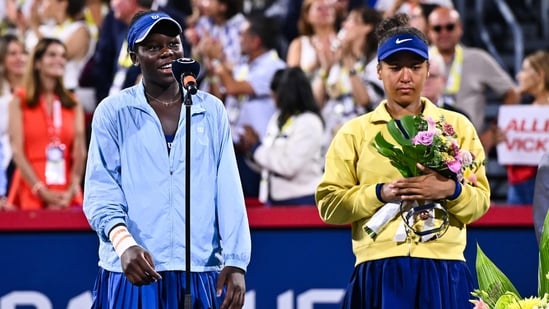 Victoria Mboko of Canada addresses the spectators following her victory against Naomi Osaka of Japan(Getty Images via AFP)