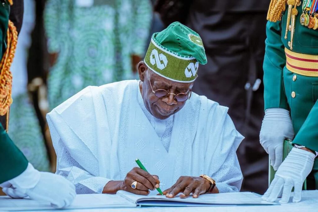 Tinubu signs