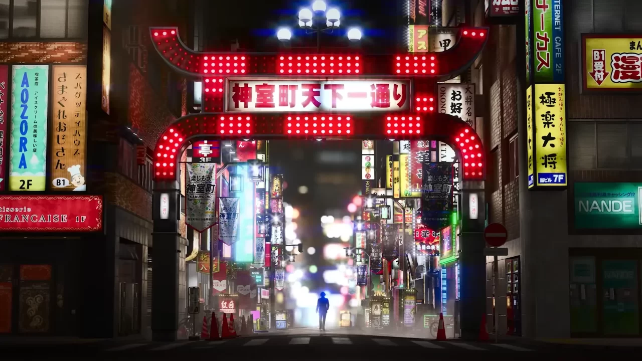 Screenshot of a tall red gate leading into the district of Kamurochō from Yakuza / Like a Dragon 8.