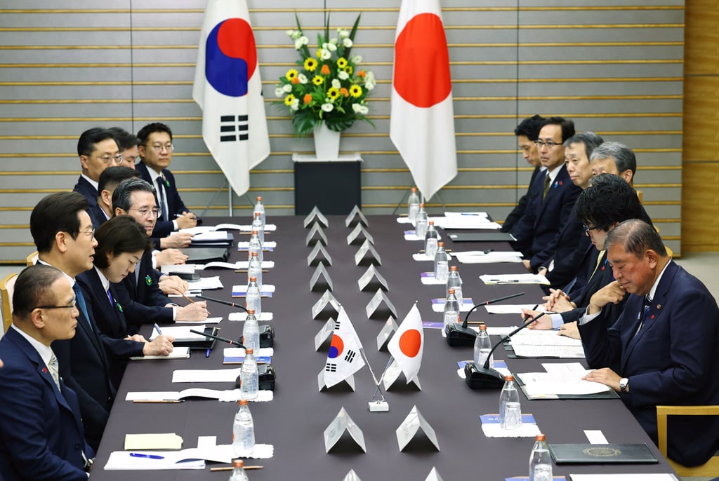 South Korean President Lee Jae-myung, (second bottom left) meets Japan’s Prime Minister Shigeru Ishiba (bottom right) in Tokyo on Saturday. Photo: AP