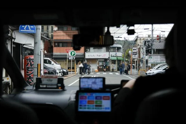 Daniel Gorostieta/Travel + Leisure View of Kyoto through a local taxi.