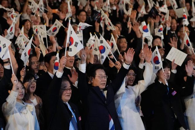 South Korean president Lee Jae-myung (center) and his wife, Kim Hye-kyung (center right), during the 80th anniversary of Korea's liberation, in Seoul, August 15, 2025.