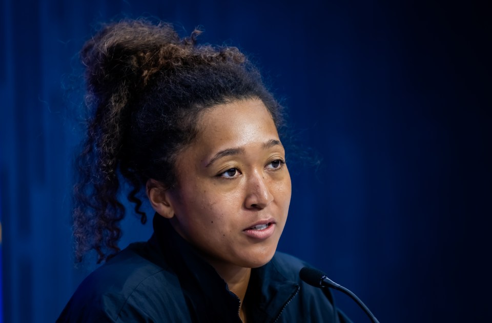 Naomi Osaka speaking at a press conference.