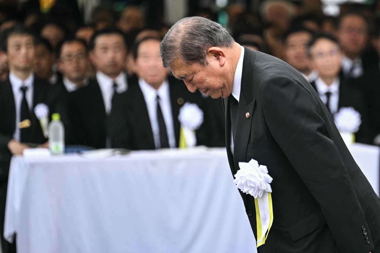 Japan's Prime Minister Shigeru Ishiba bows as he approaches the podium to give a speech during the annual memorial ceremony for the victims at the Peace Park in Nagasaki on Aug.9  to mark the 80th anniversary of the atomic bombing during WWII.  (AFP)