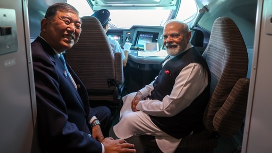 Japanese Prime Minister Shigeru Ishiba and PM Modi smile to take a picture while travelling in a Shinkansen bullet train from Tokyo to Sendai, in Tokyo(PMO/ANI)