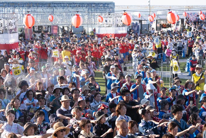 Rows of people at the largest bon dance