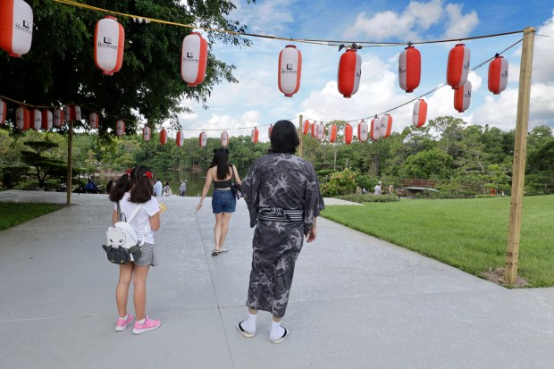 People enjoy the Morikami Museum and Japanese Gardens in Delray...