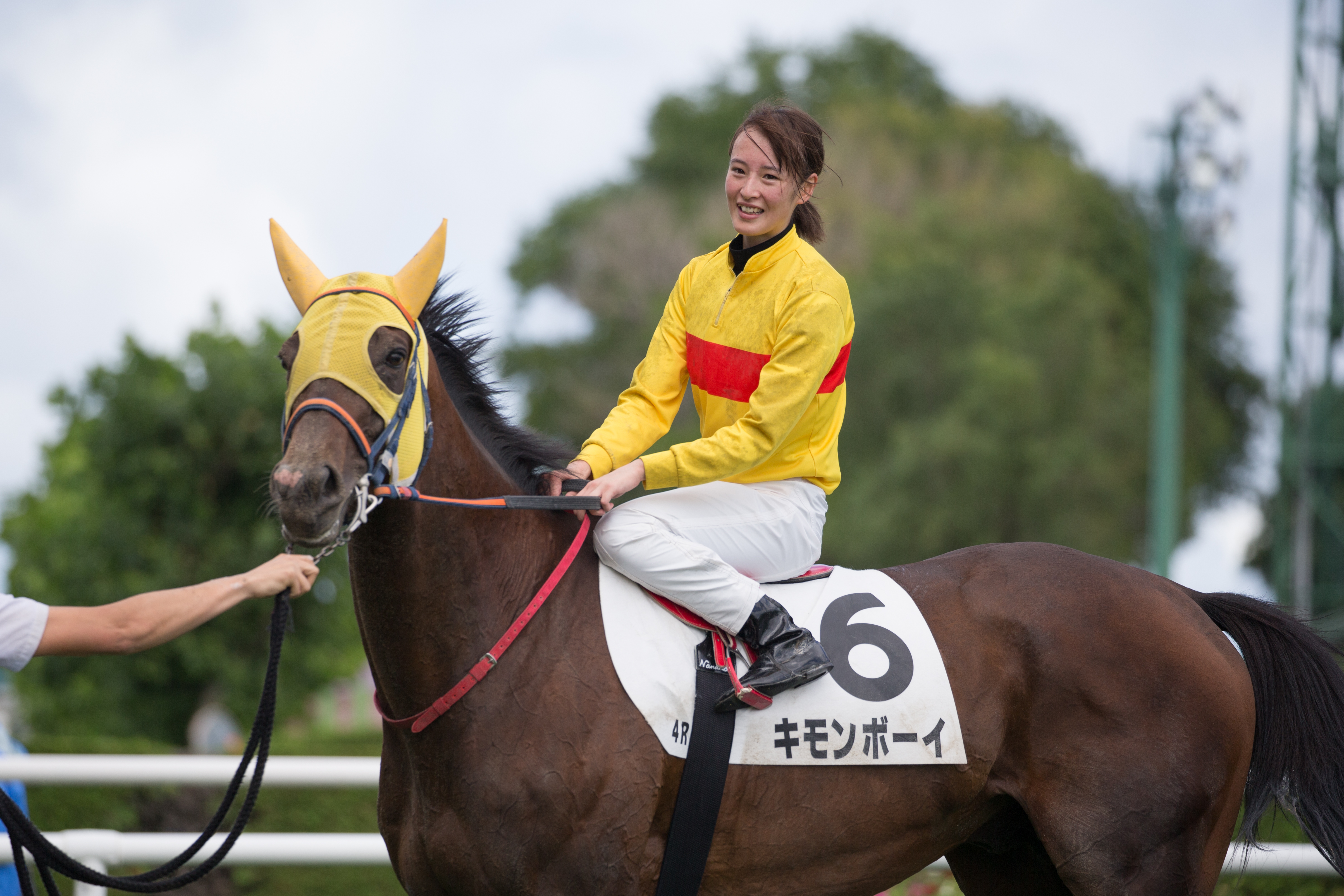 Jockey Nanako Fujita on winning horse Kimon Boy at Sapporo Racecourse.
