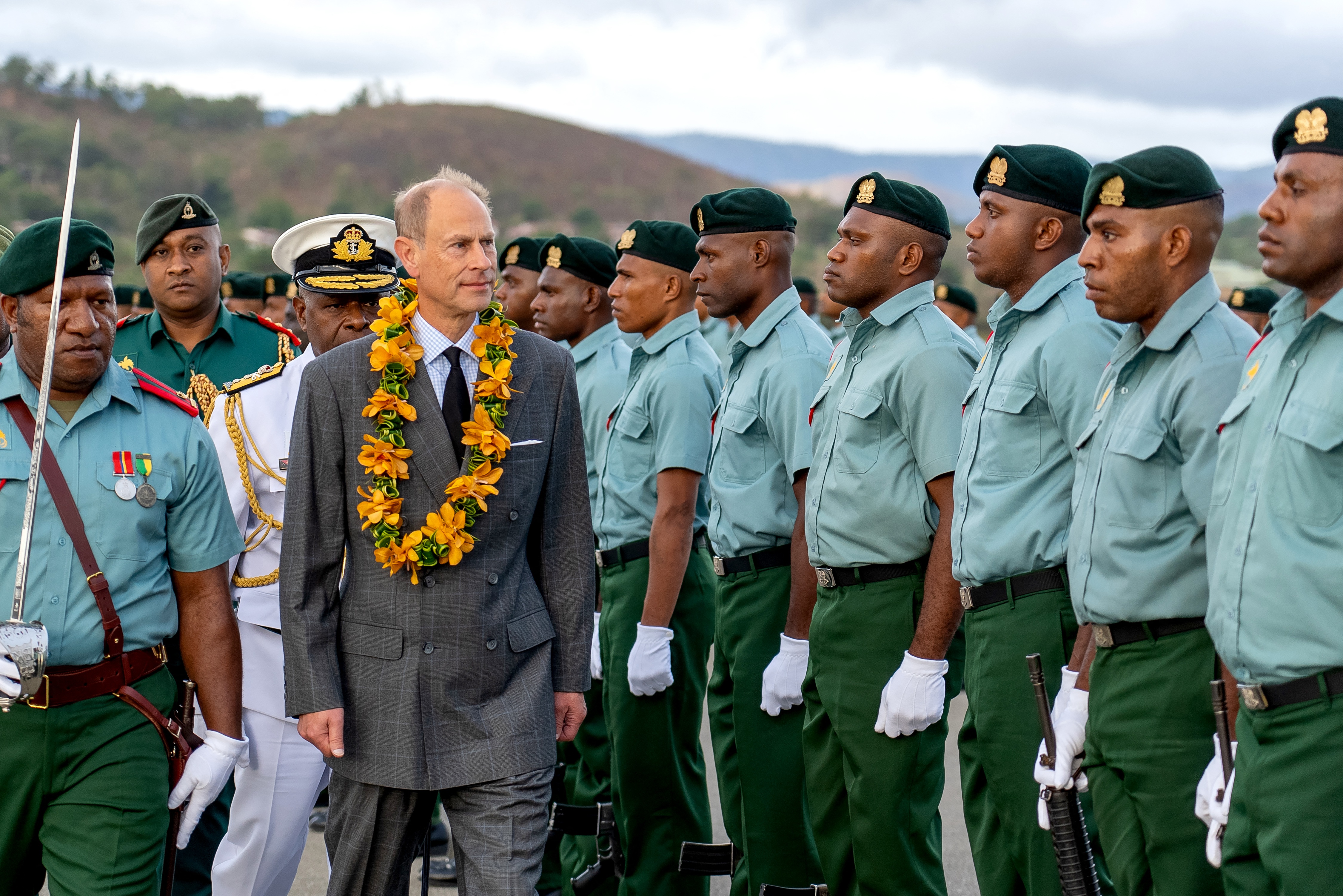 Prince Edward inspecting a guard of honor in Papua New Guinea.