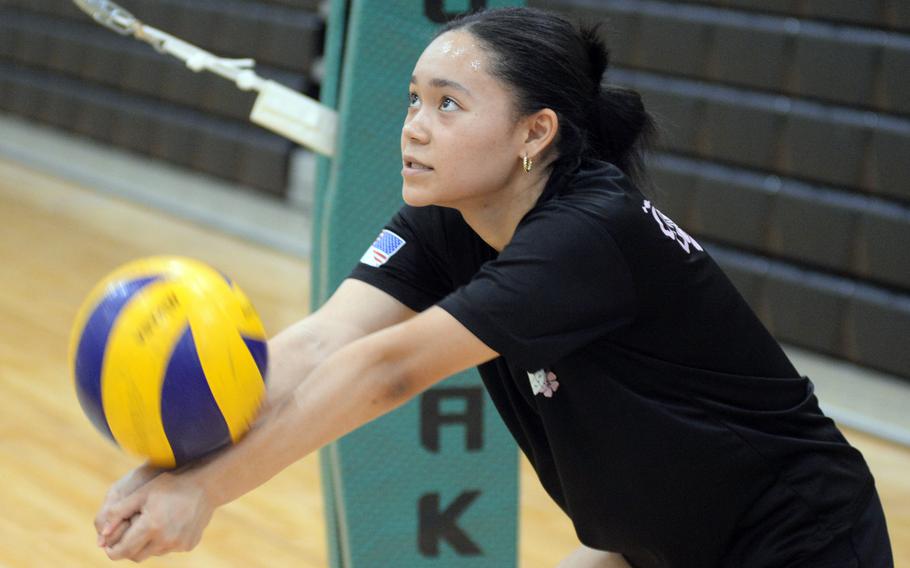 Ria McGriff bumps the ball.