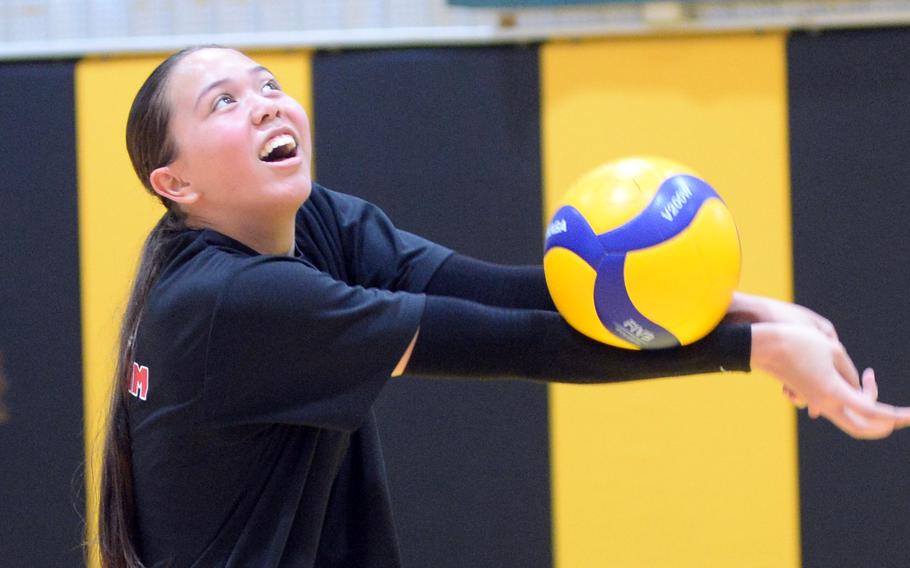 Samantha Kehe bumps the ball.