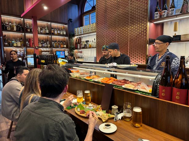 You can see the sushi chefs work right in front of you if you sit at the counter