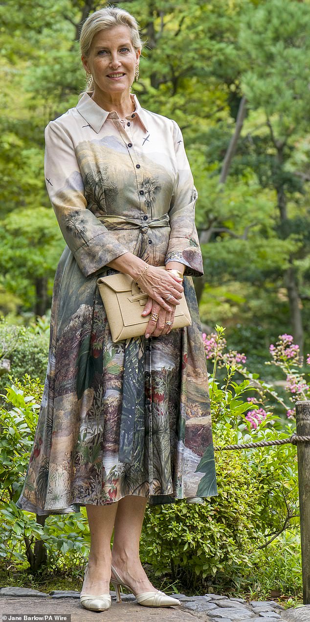 The Duchess (pictured in the gardens of the Nezu Museum in Minato City in Tokyo), donned a silk print dress for her engagements on day two of her Japan tour