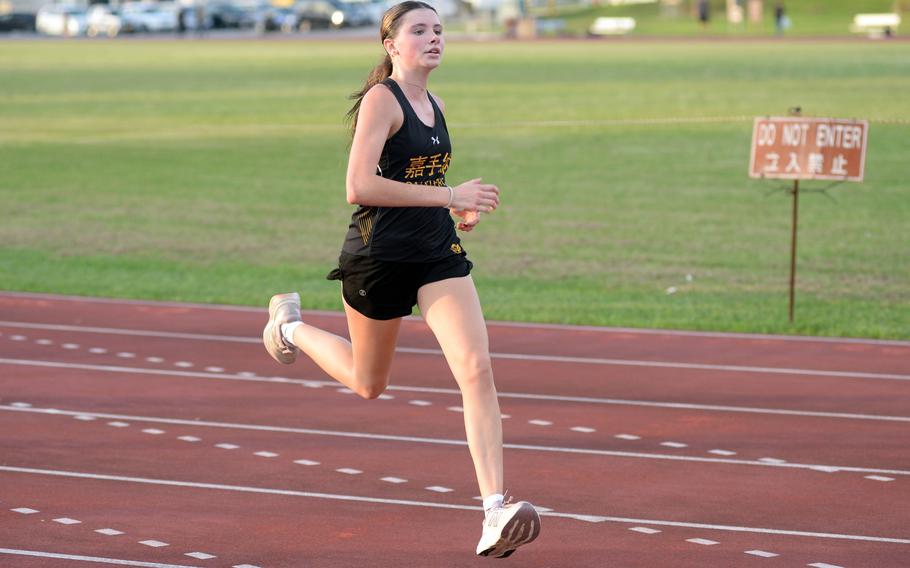 Allie Sims crosses the finish line.
