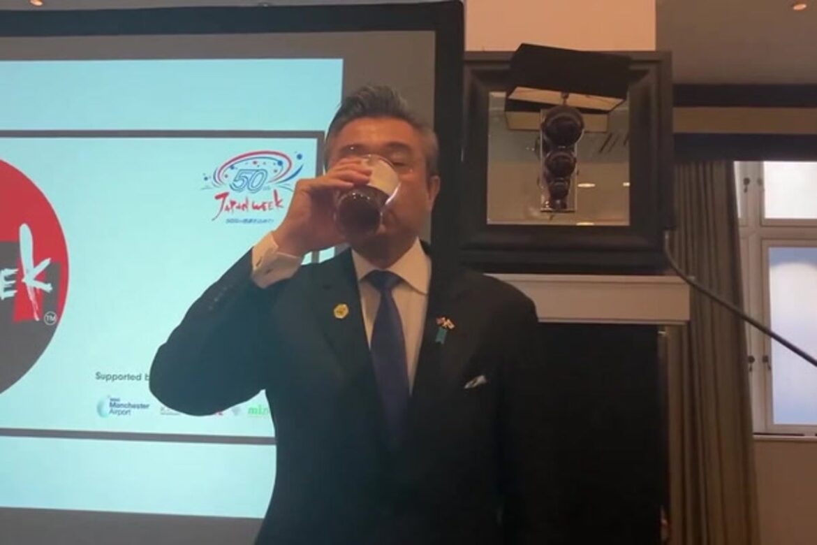 Japanese ambassador cheered on by pub crowd as he downs pint of bitter in Manchester The Independent