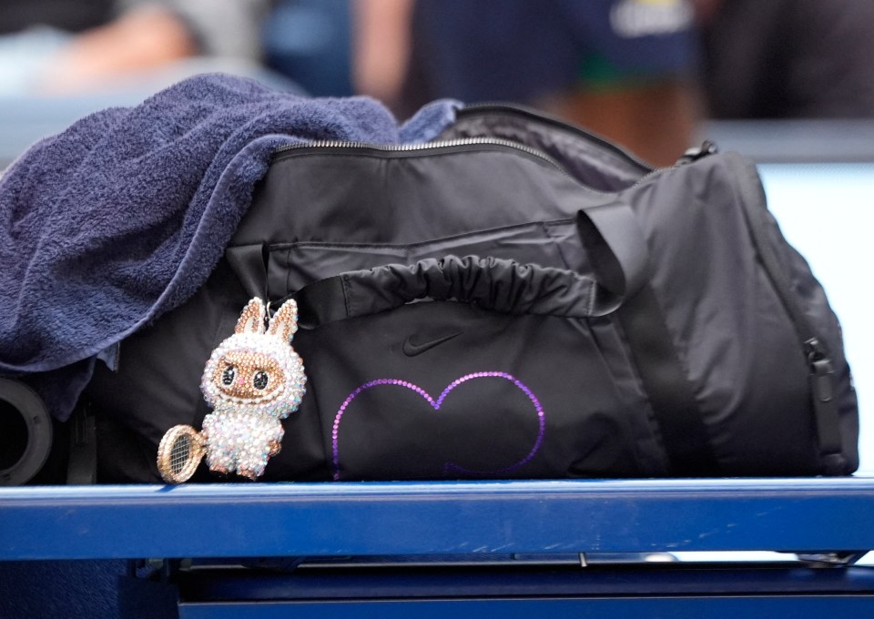 Naomi Osaka's Labubu doll on her bag at the US Open.