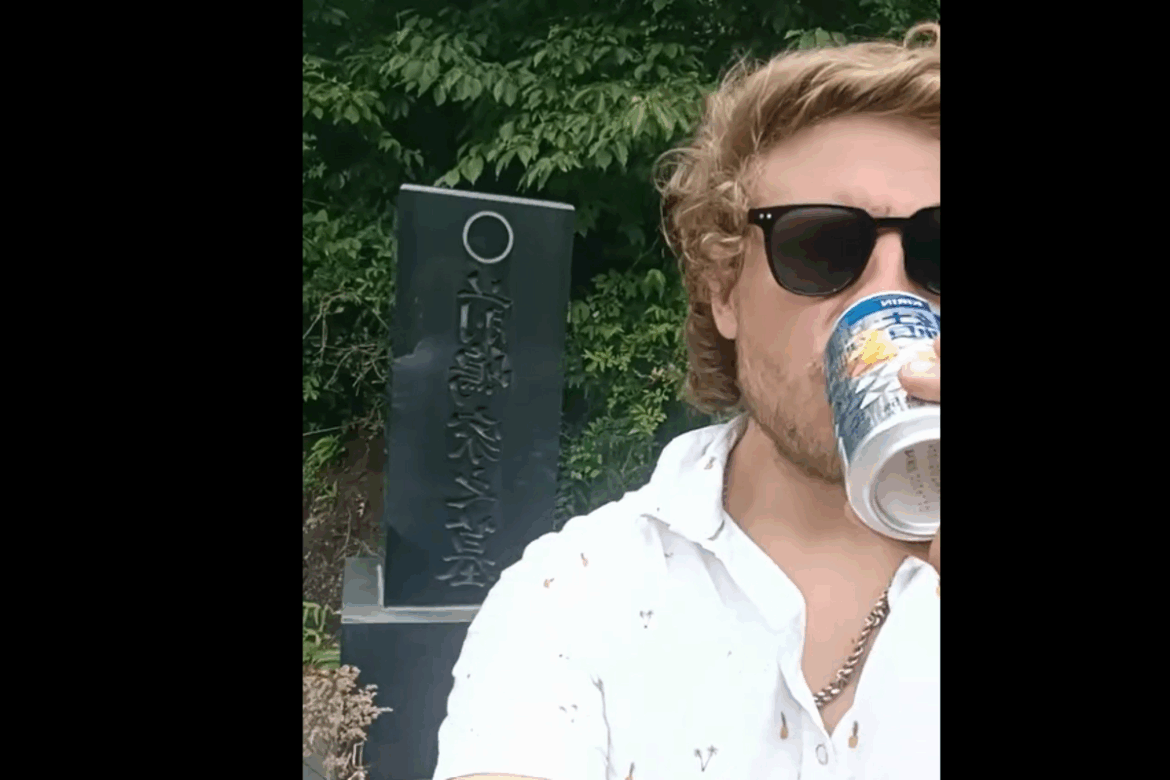 Australian embassy issues warning after tourist drinks offering at Japanese burial site