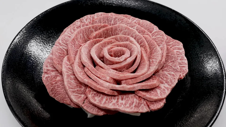 A rose made out of raw wagyu meat. 