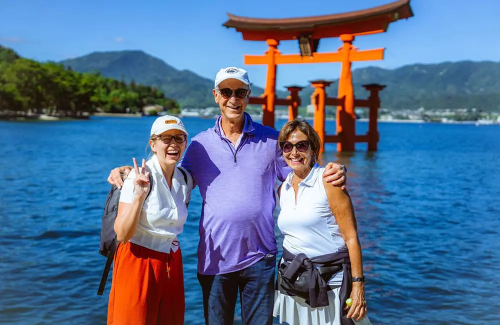InsideJapan tour leader and clients in Miyajima.