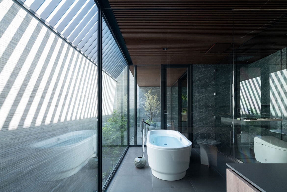 Stealth Is a Home Hidden Behind a Monolithic Facade in Tokyo