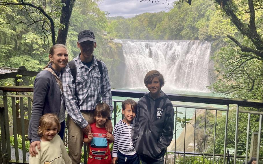 The Marcos Family poses for a photo in Taipei’s central park.