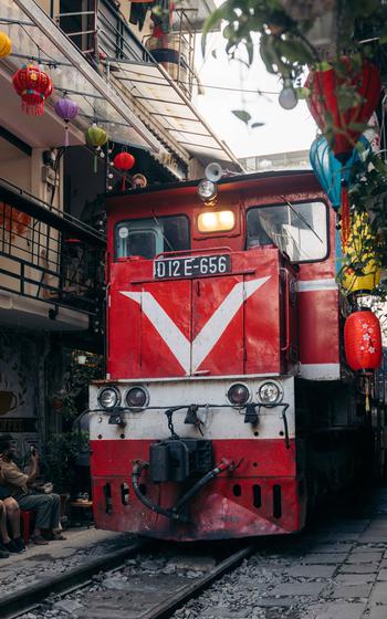 A train runs in Hanoi Train Street.