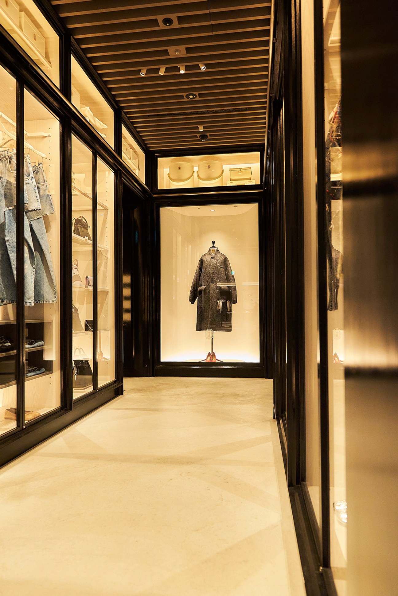 Gallery-like hallway leading to designer shops