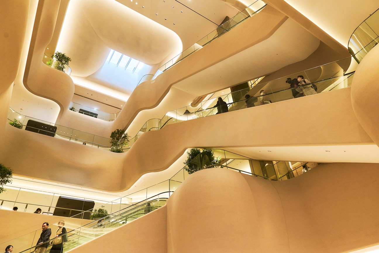 Curved staircase in a contemporary building at Azabudai Hills