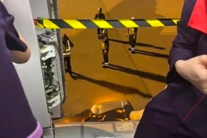 An emergency exit door and evacuation slide were accidentally triggered on a Hong Kong Airlines plane after landing in Osaka. (Photo: Handout via South China Morning Post)