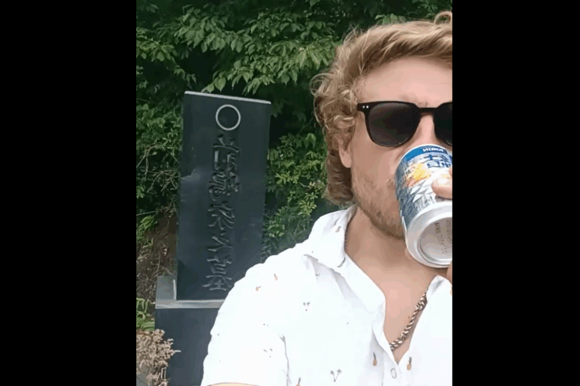 Australian embassy issues warning after tourist drinks offering at Japanese burial site