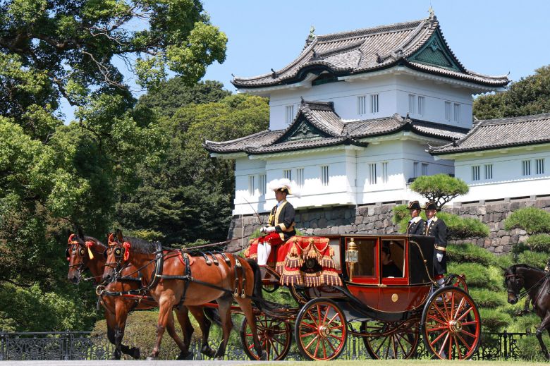 Japan's Prince Hisahito leaves on a horse-drawn carriage after attending his coming-of-age ceremony in Tokyo on Saturday.