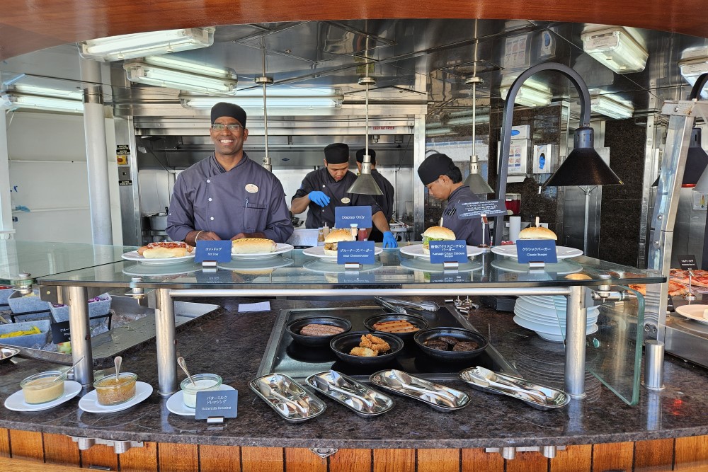 crew at the poolside grill on mitsui ocean fuji cruise ship