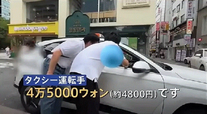 Posing as tourists, TBS News Dig reporters try to hail a taxi in Myeong-dong, central Seoul. The driver overcharged 45,000 won ($32) for the relatively short trip to Hongdae. (TBS News Dig)