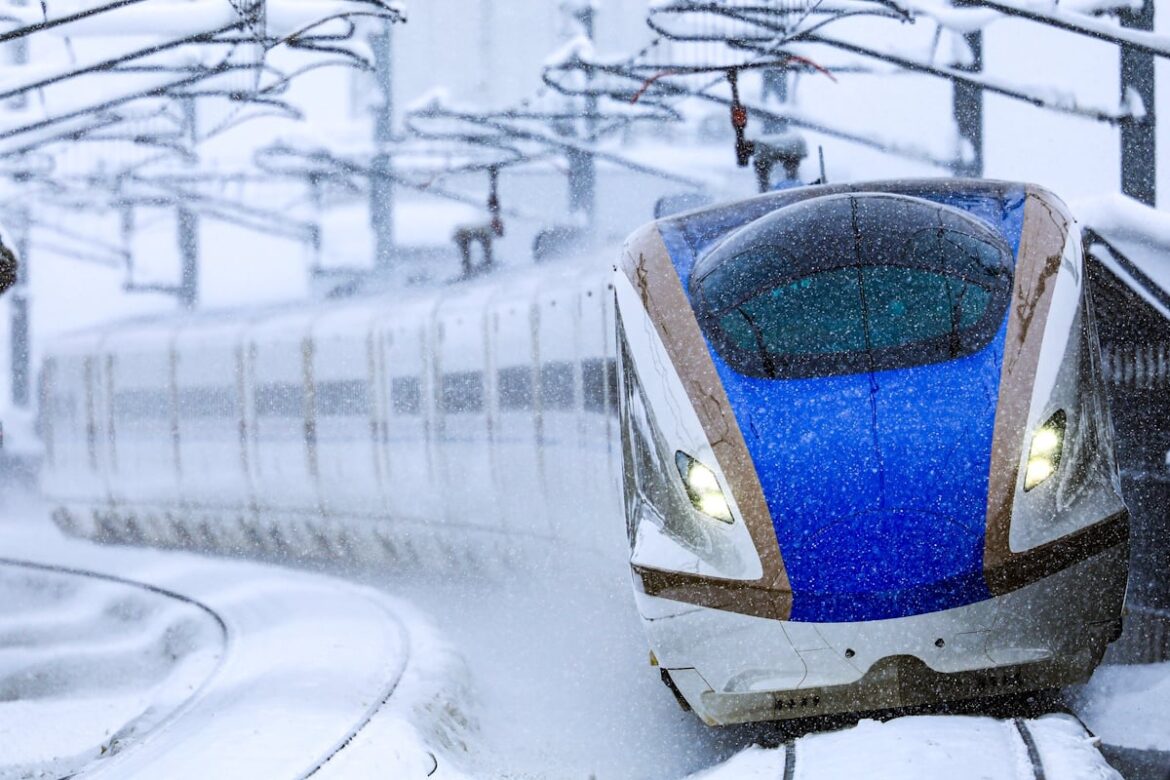 Hokuriku Shinkansen (bullet train) operating during a big snowstorm