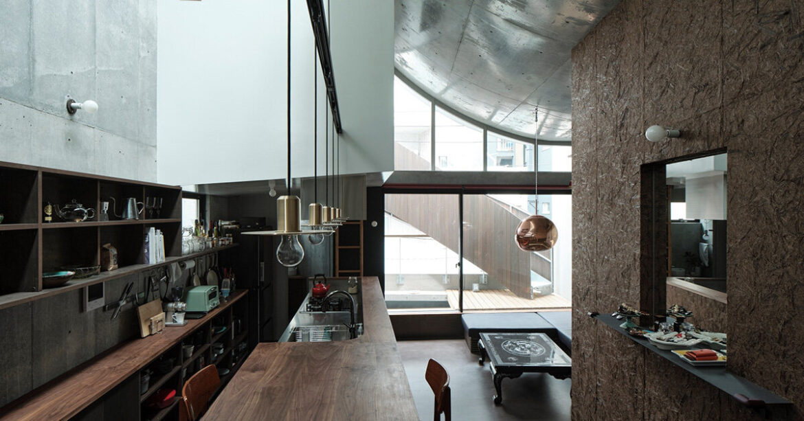 curved roof brings light into AOIM’s three-story residence in tokyo curved roof brings light into AOIM's three-story residence in tokyo