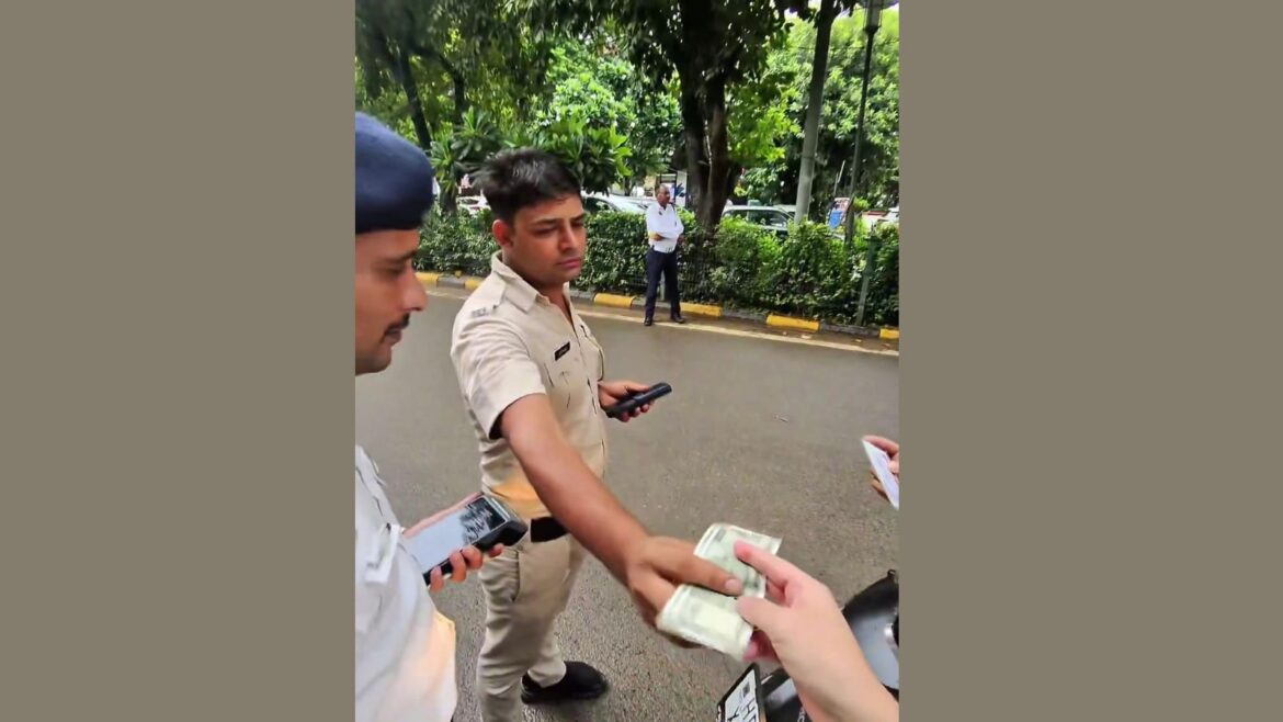 When smart glasses, social media brought ‘bribe’ takers to justice: a Japanese tourist’s encounter with Gurgaon traffic police | Delhi News The Japanese tourist handed over two crisp Rs 500 notes, and the officers were captured on video counting the bills with satisfaction, one even flashing a smile.