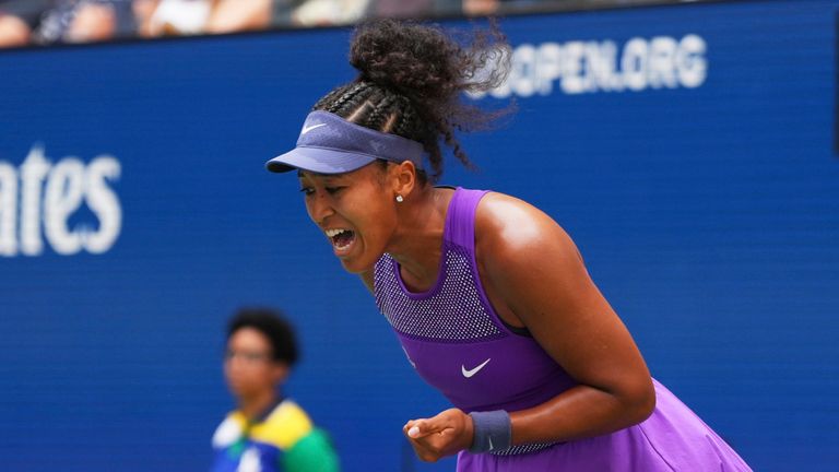 Naomi Osaka, of Japan, reacts during a match against Coco Gauff, of the United States, in the fourth round of the US Open tennis championships, Monday, Sept. 1, 2025, in New York. (AP Photo/Kirsty Wigglesworth)