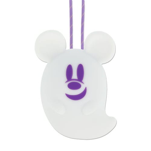 A white ghost charm with mouse ears and a purple smile, part of 2025 Halloween merchandise at Tokyo Disney Resort.