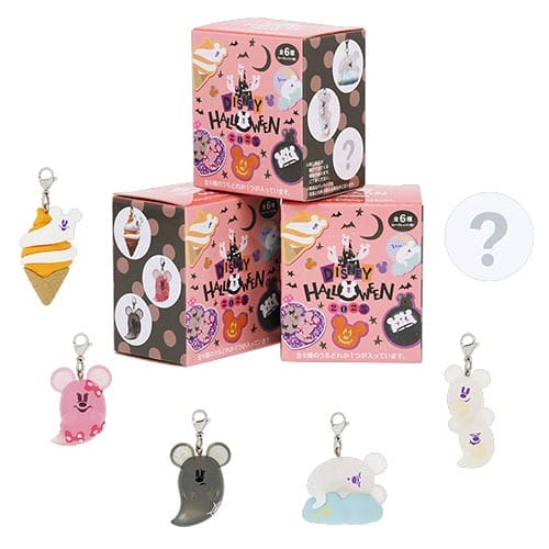 Three Tokyo Disney Resort 2025 Halloween merchandise blind boxes and six colorful Mickey ghost keychains.
