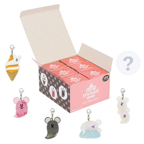 A box of Tokyo Disney Resort Halloween Merchandise with five Mickey Mouse-shaped keychains and one mystery keychain.